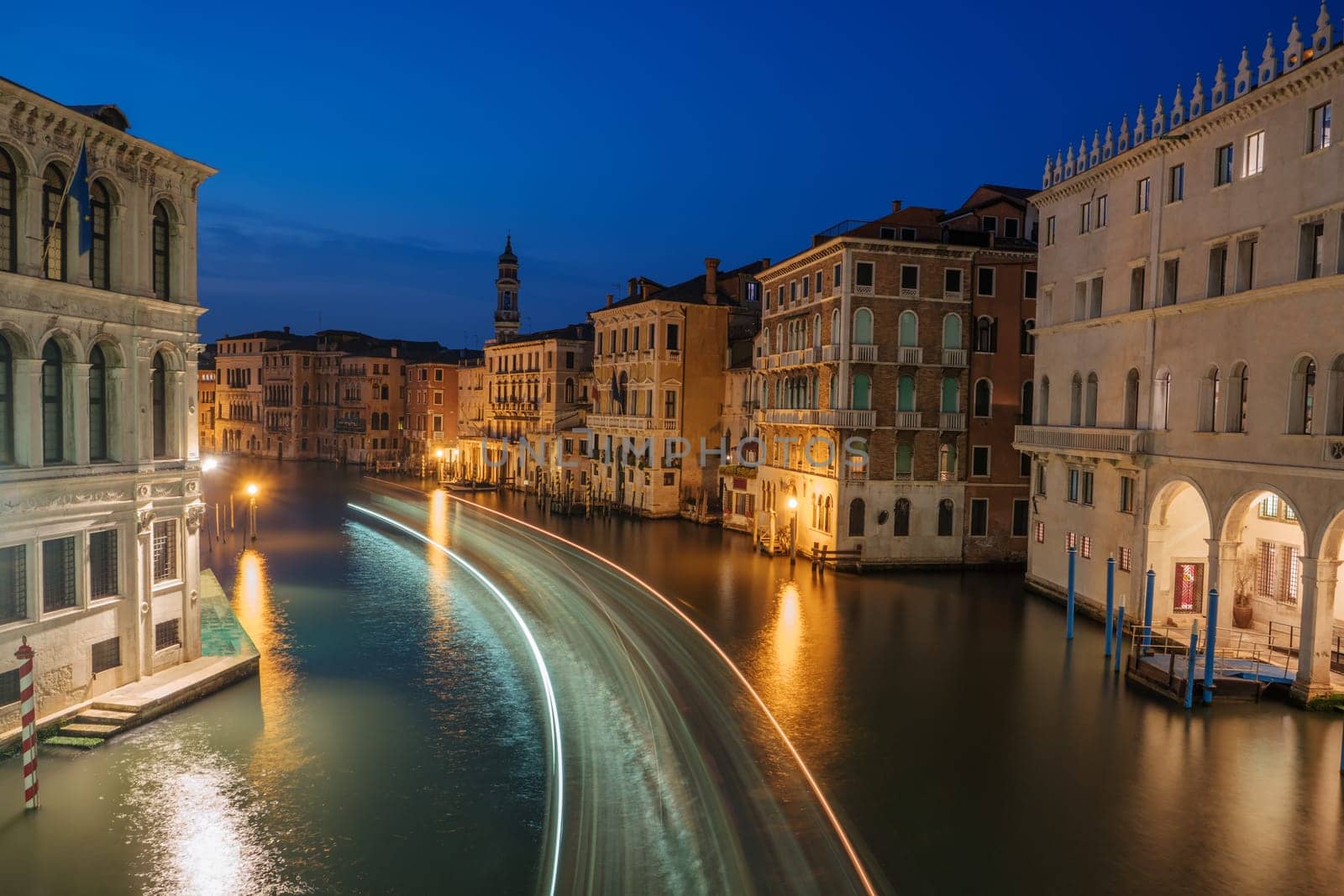 Venice at night, Italy, Europe. Grand Canal, old buildings. Water street, historic houses. Traditional italian tenements on channel. Famous travel destination, landmark. Venice with night illumination