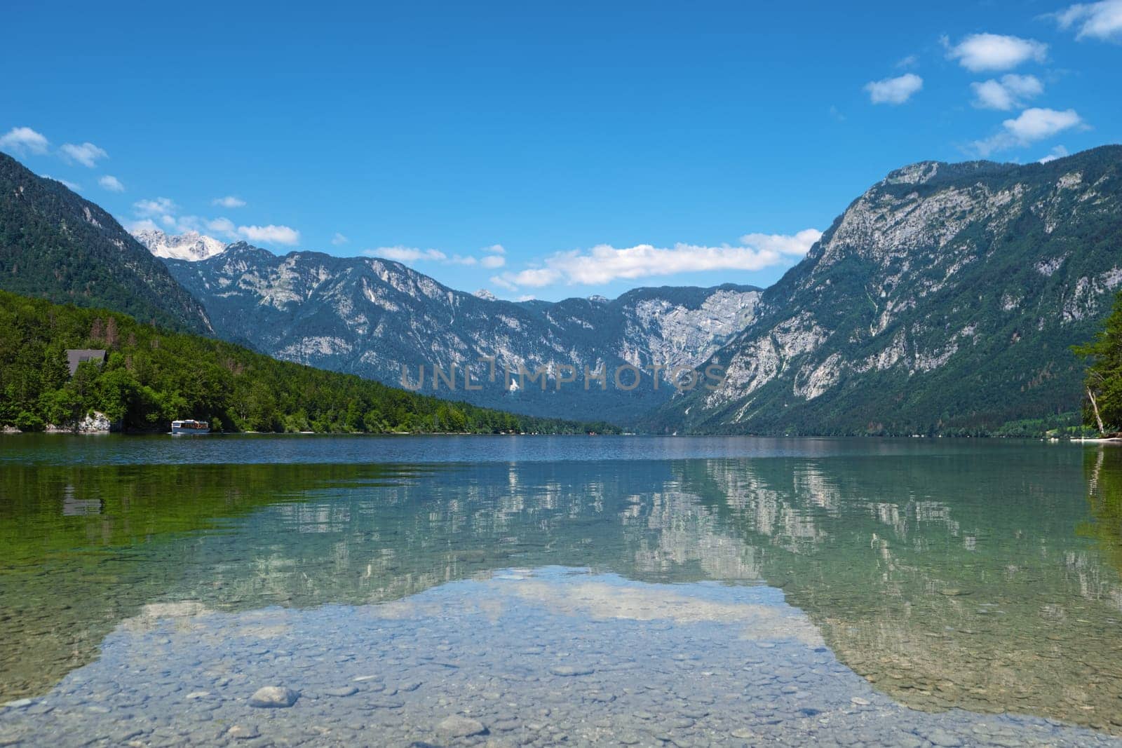 Bohinj Lake, Triglav national park, Slovenia, Alps, Europe. Mountain alpine lake. Slovenian nature. Adventure ecotourism concept Summer landscape Popular landmark Famous travel destination of Slovenia