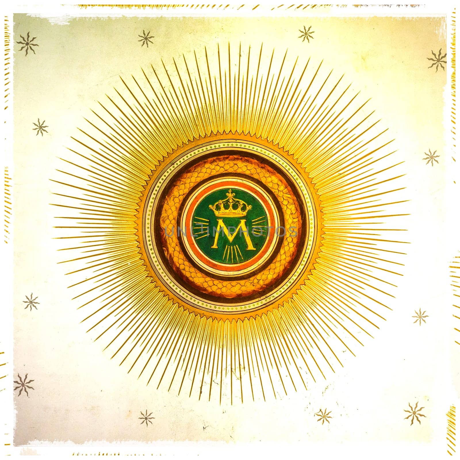 Monogram of the Our Lady, with crown, sun and stars on the background. Grungy frame..