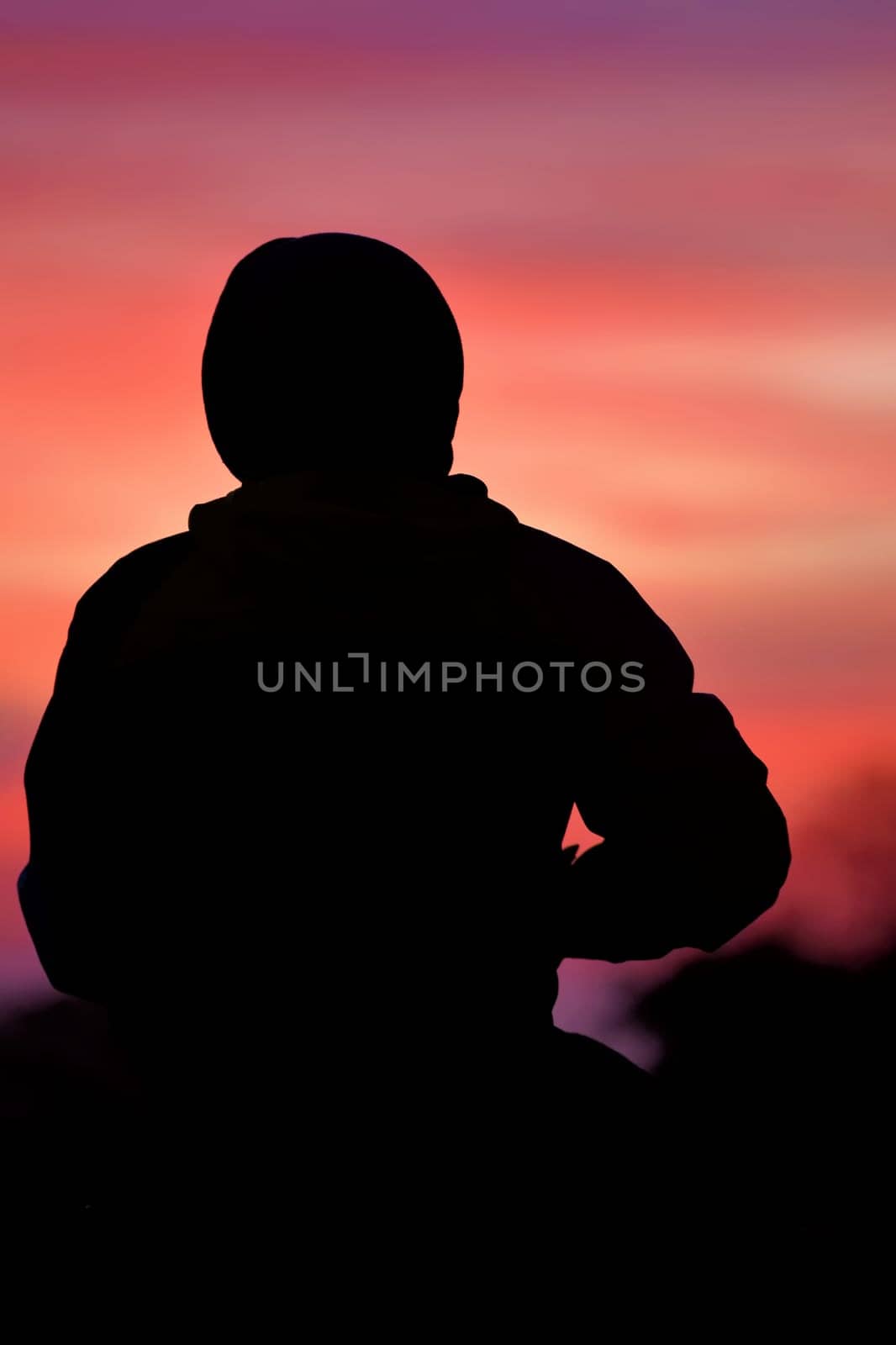 young man in the sunset