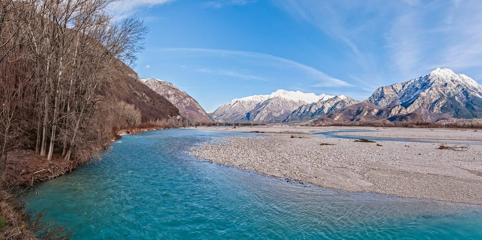 Beauty landscape of mountains and river. Alps Friuli Italy.