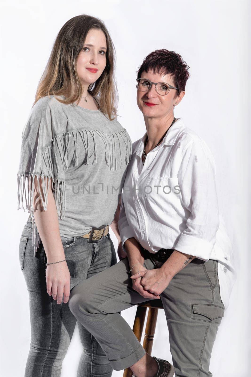 Portrait of two women standing next to each other