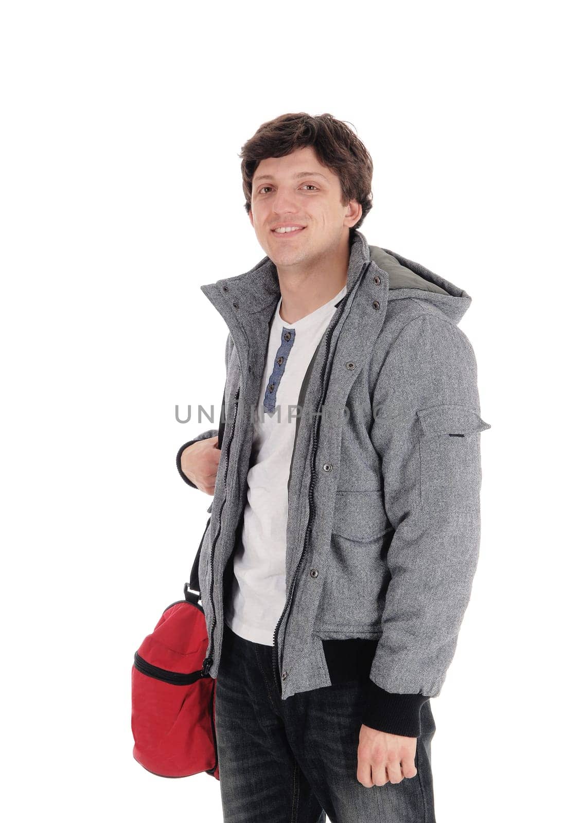 A young smiling handsome man standing in closeup in a gray jacket and red.gym back smiling isolated for white background.