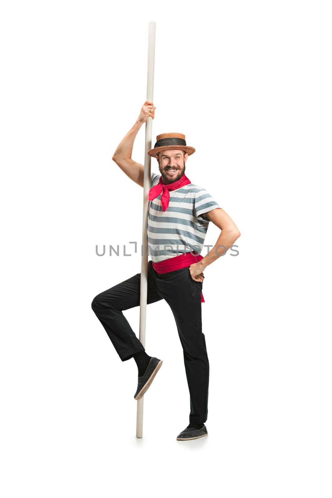 Caucasian funny bearded man in traditional gondolier costume and hat with paddle posing at studio isolated on white background. Young man shouting. Shout. Crying emotional man screaming. Human emotions, facial expression concept