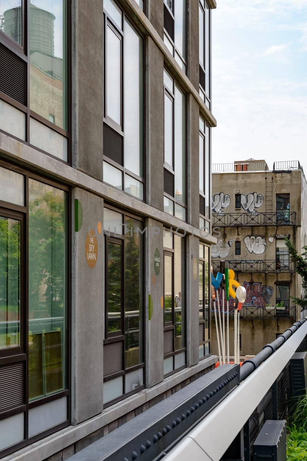 New York, NY, USA - June 8, 2015: The High Line Park in New York City, USA. It is a 2,33 km long elevated linear park, greenway and rail trail, created on a former New York Central Railroad spur on the west side of Manhattan.