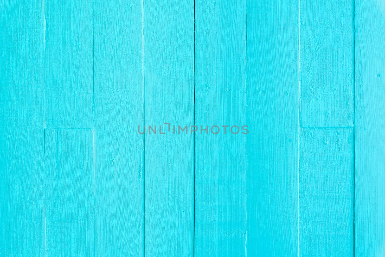 Pastel white and blue wooden table background texture.