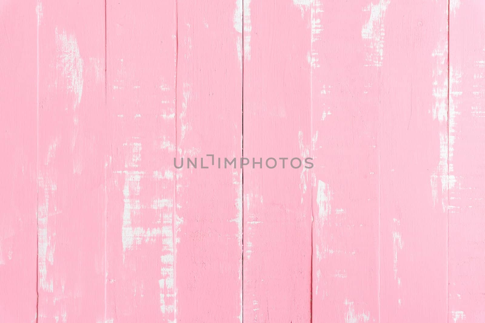 Pastel white and pink wooden table background texture.