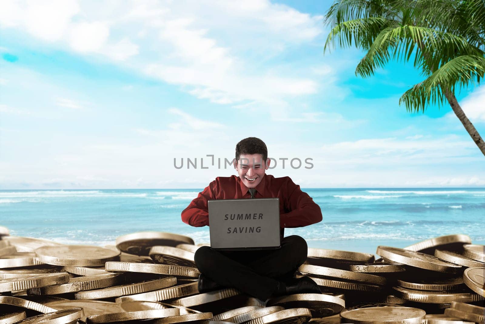 Handsome asian businessman with laptop sitting on coin stacks. Summer saving concept