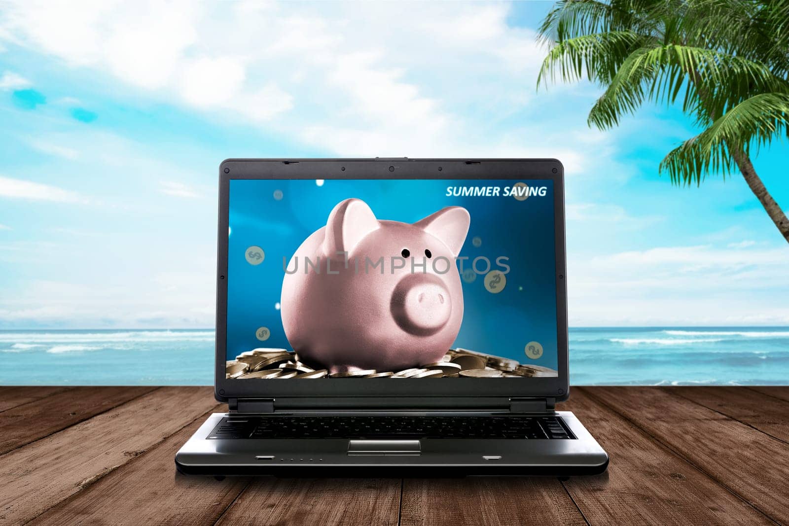 Summer savings sign in laptop at wooden plank. Summer saving concept