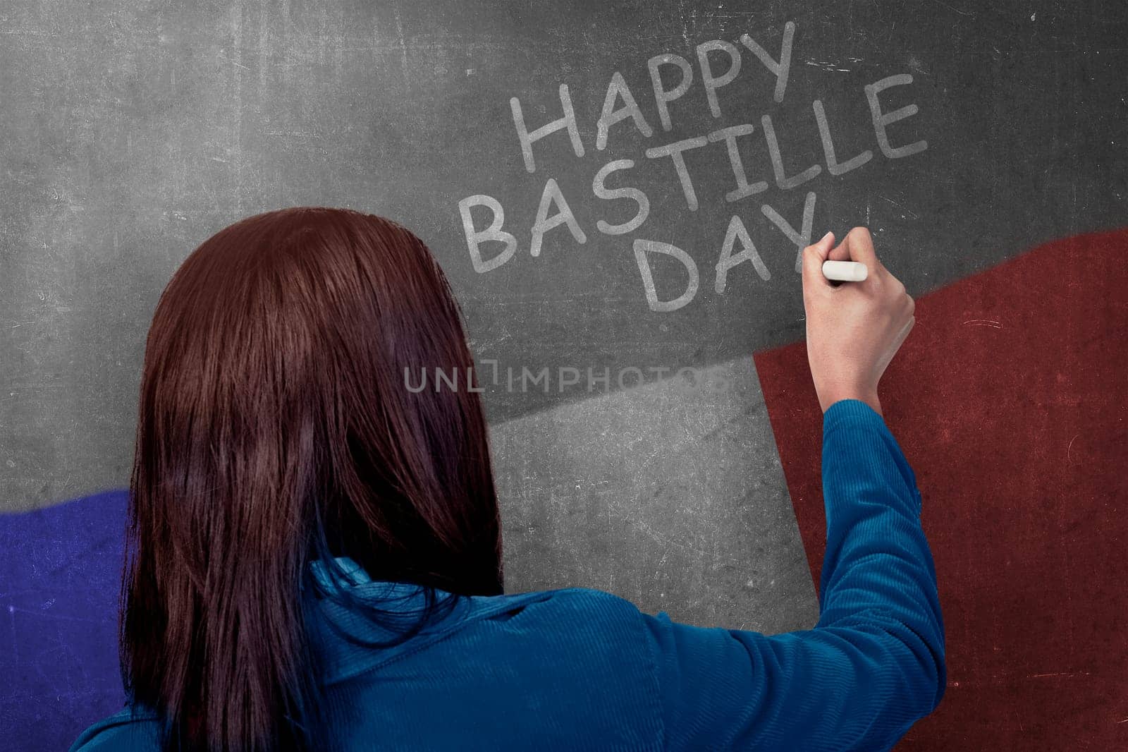 Rear view of woman writing happy bastille day on the wall. Happy Bastille Day
