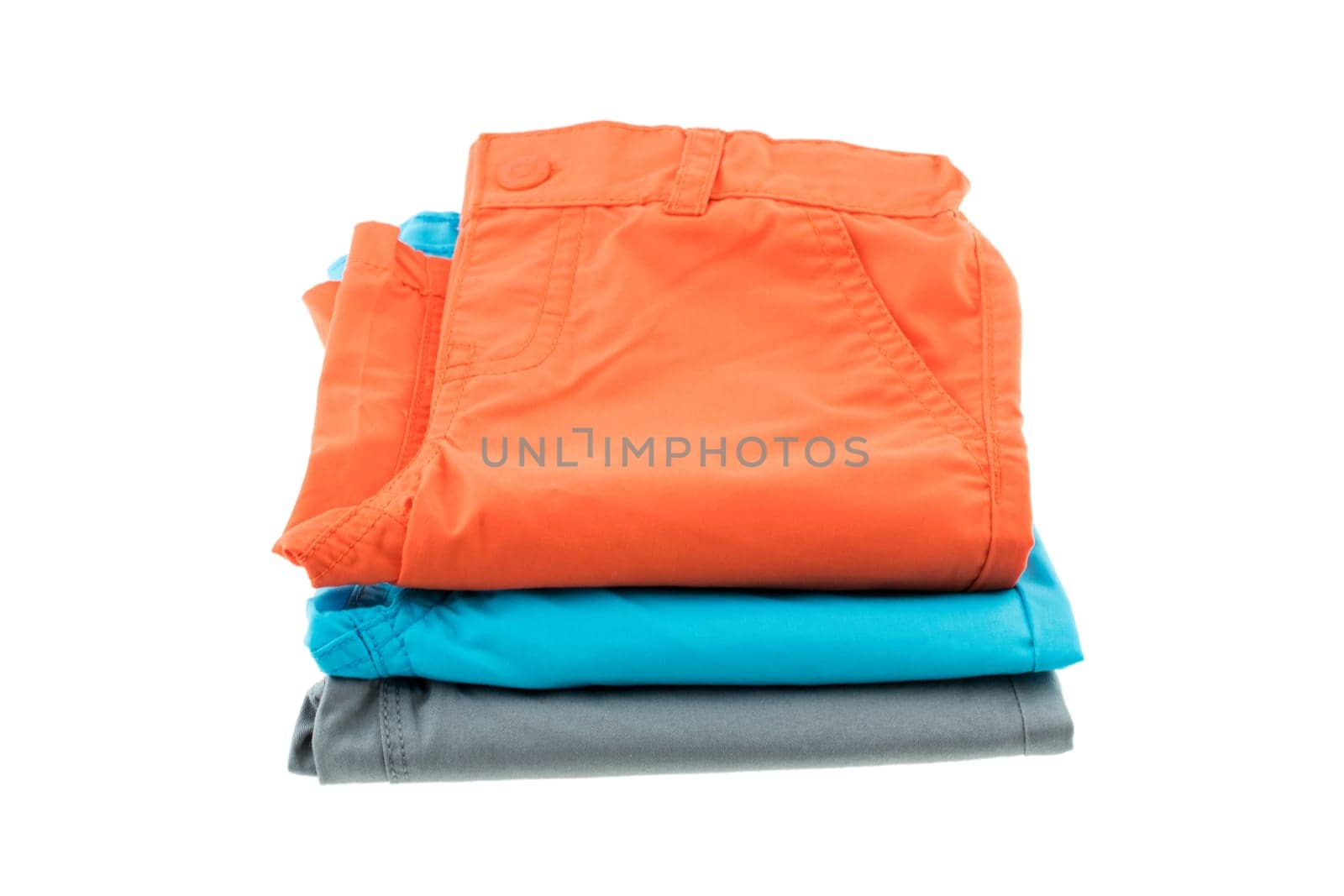 stack of colorful shorts for a boy