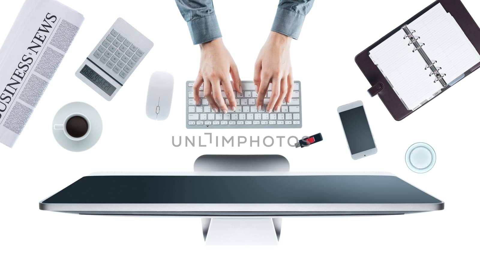 Business woman working at office desk and typing on a keyboard, white background, hands top view