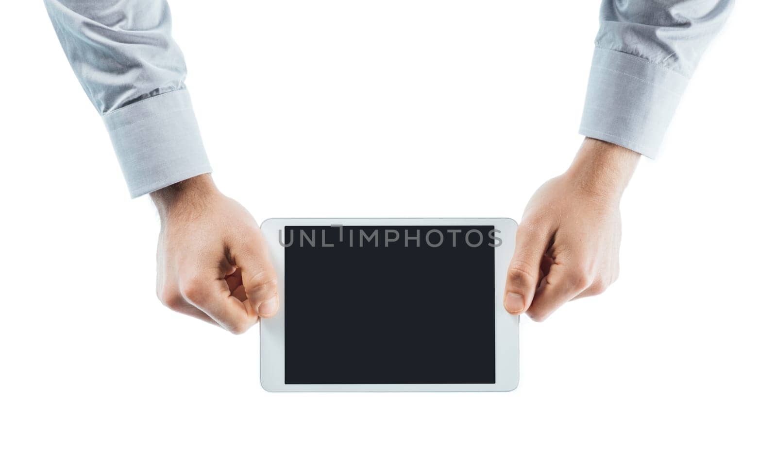 Businessman using a digital tablet hands close up with copy space, unrecognizable person