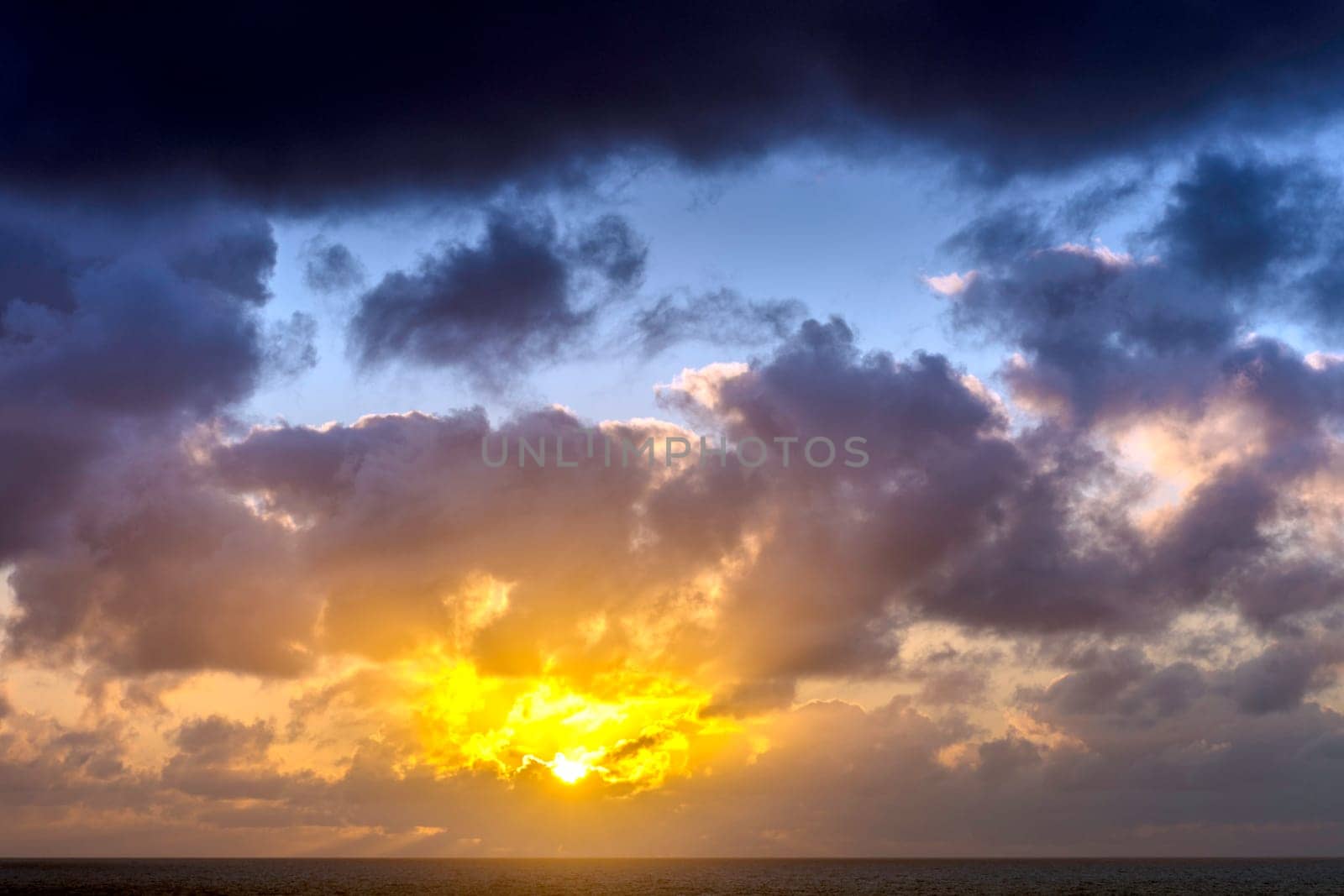 Dramatic sunrise over the ocean before storm - Lanzarote, Canary Islands, Spain