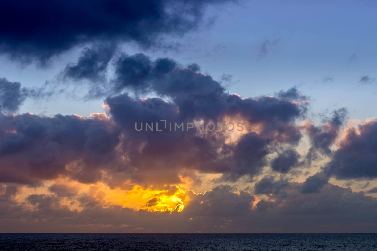 Dramatic sunrise over the ocean before storm - Lanzarote, Canary Islands, Spain