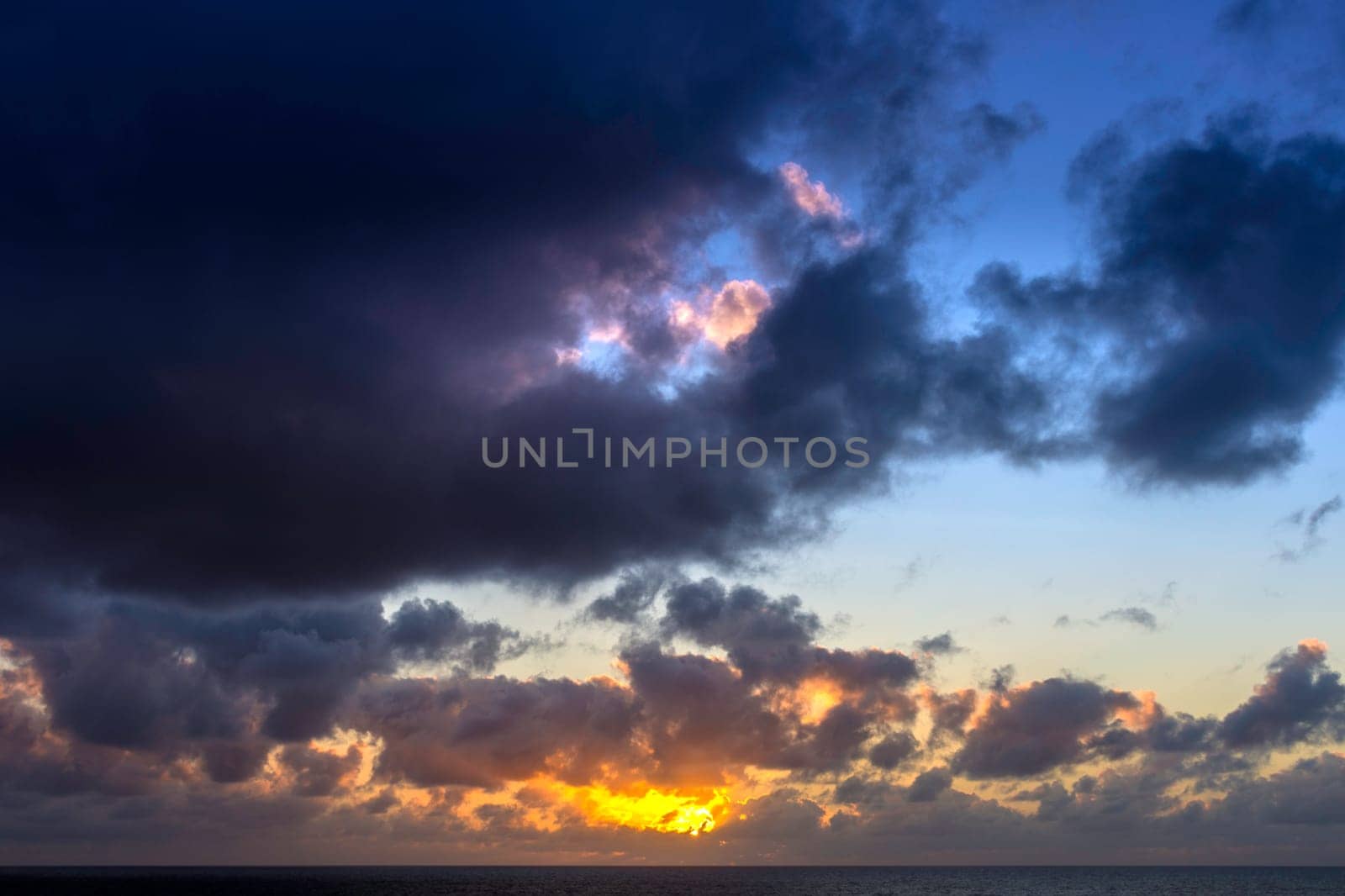 Dramatic sunrise over the ocean before storm - Lanzarote, Canary Islands, Spain