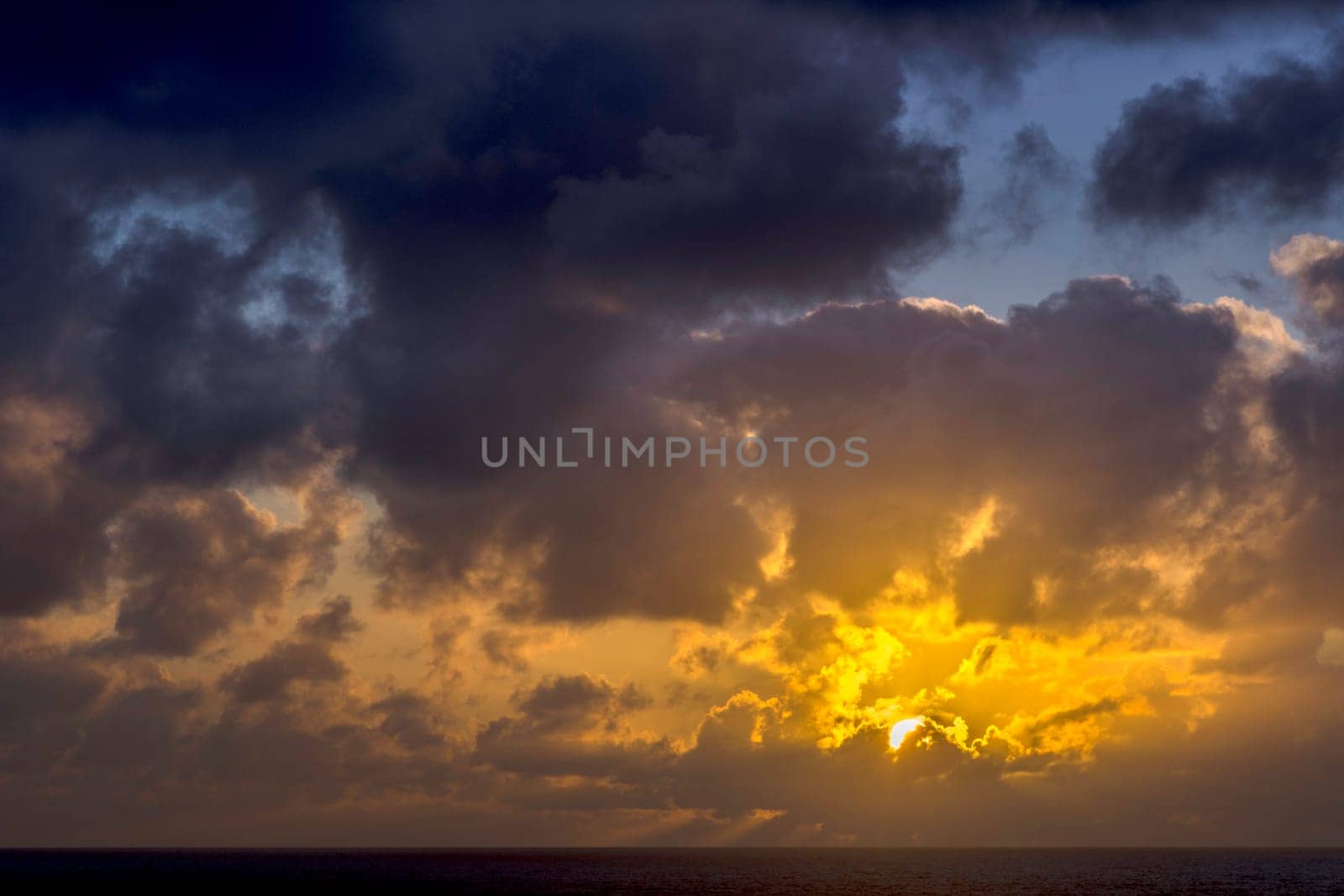 Dramatic sunrise over the ocean before storm - Lanzarote, Canary Islands, Spain