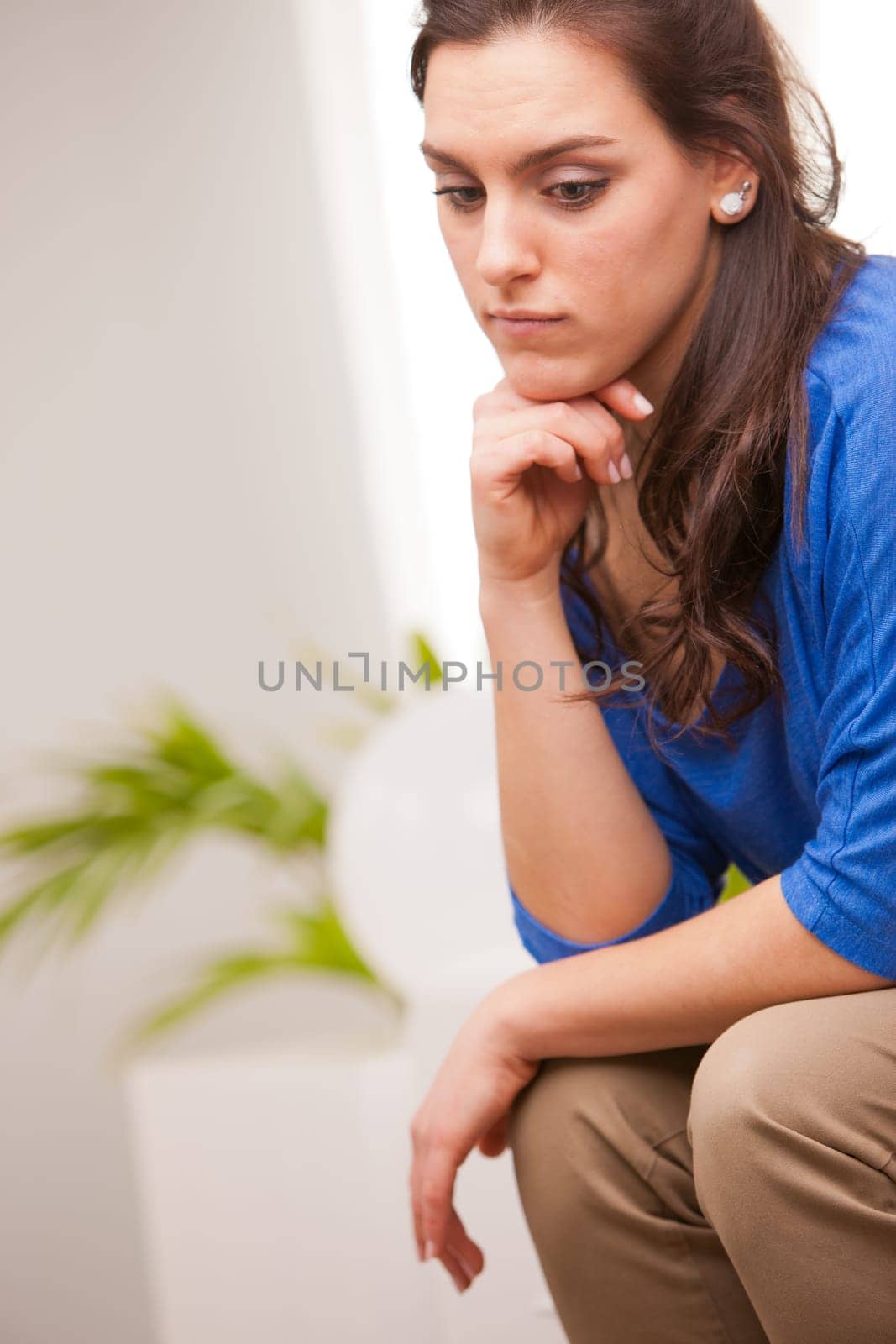 young woman thinking about what's going to happen to her life or her future or job