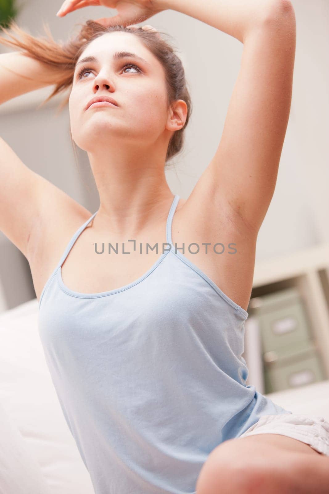 beautiful young woman brushing and thinking about her own businesses