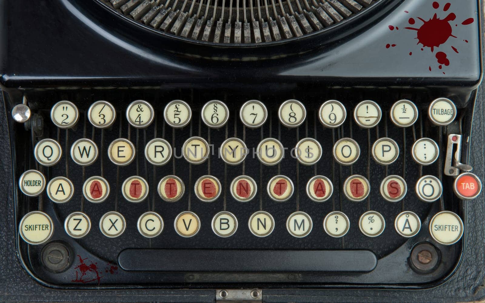 Old typewriter with terrorism