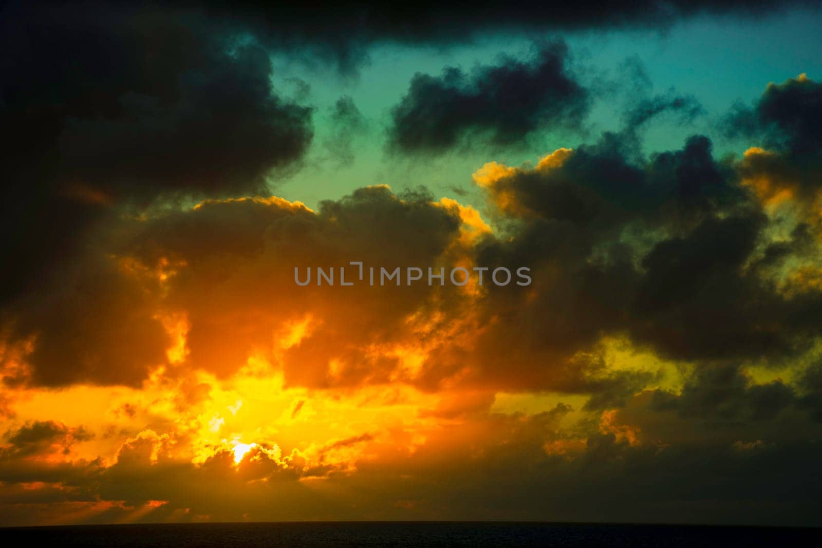 Dramatic sunrise over the ocean before storm - Lanzarote, Canary Islands, Spain