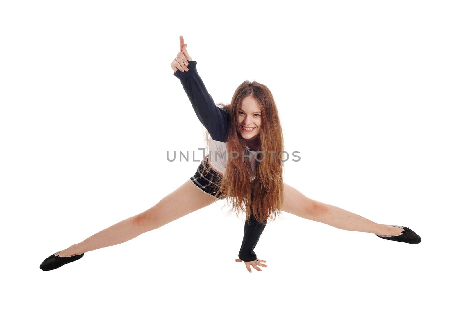 A full body image of a happy young woman with her legs stretched.smiling and on hand up in the air, isolated for white background.