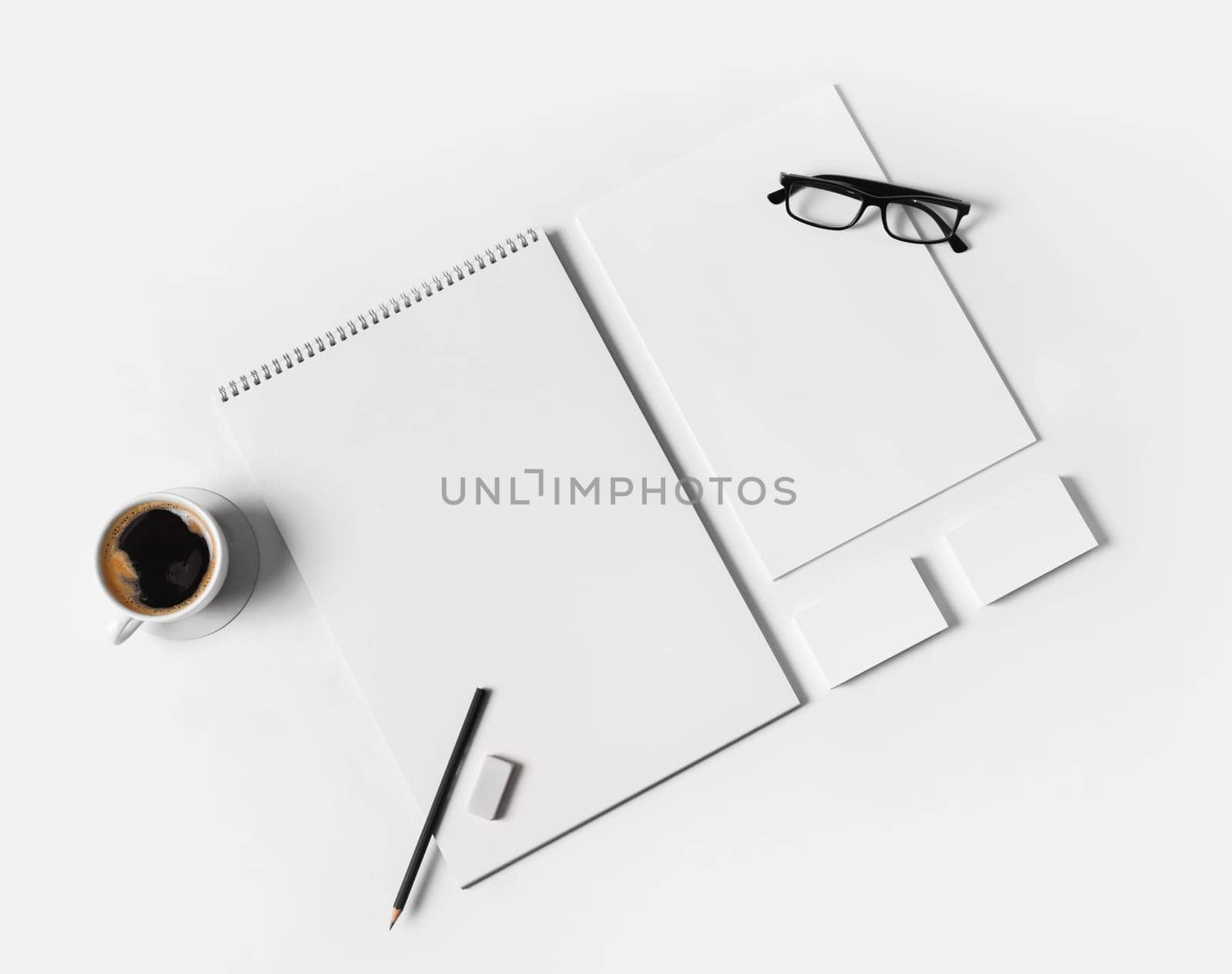 Blank stationery set on white paper background. Blank objects for placing your design. Top view. Flat lay.