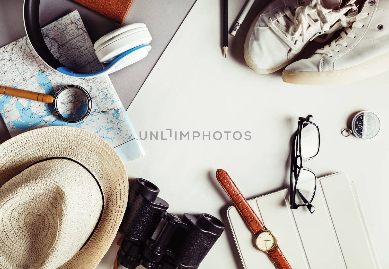 Traveler items. Vacation concept. Essential travel accessories. Vintage toned image. Top view. Flat lay