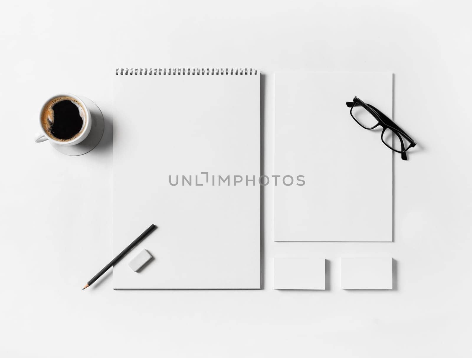 Blank branding stationery set on white paper background. Top view. Flat lay.