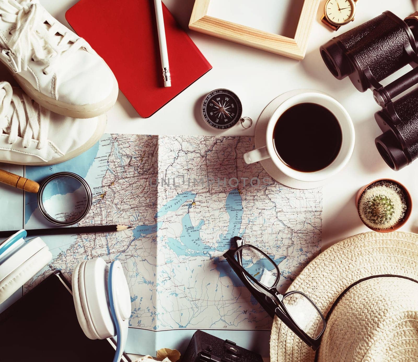 Essential travel accessories. Vacation items. Outfit of traveler. Vintage toned image. Top view. Flat lay.