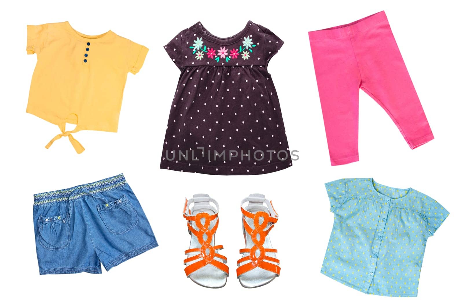 Collection of child's clothes. Kid's summerclothing set isolated.