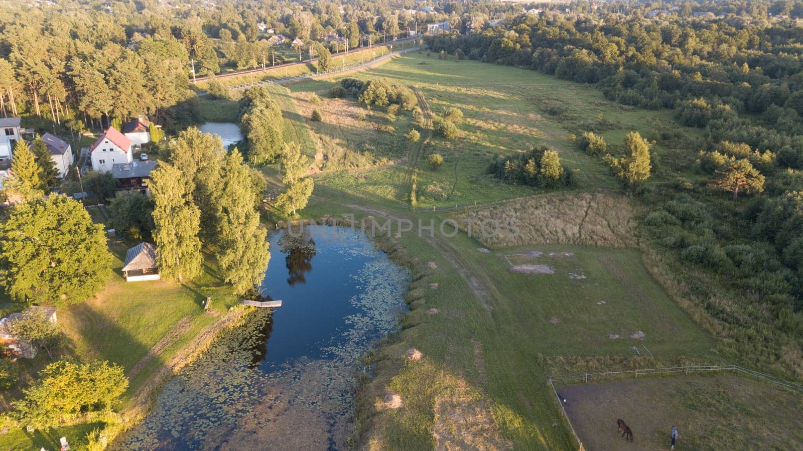 Aerial view of countryside Gauja lake field drone top view