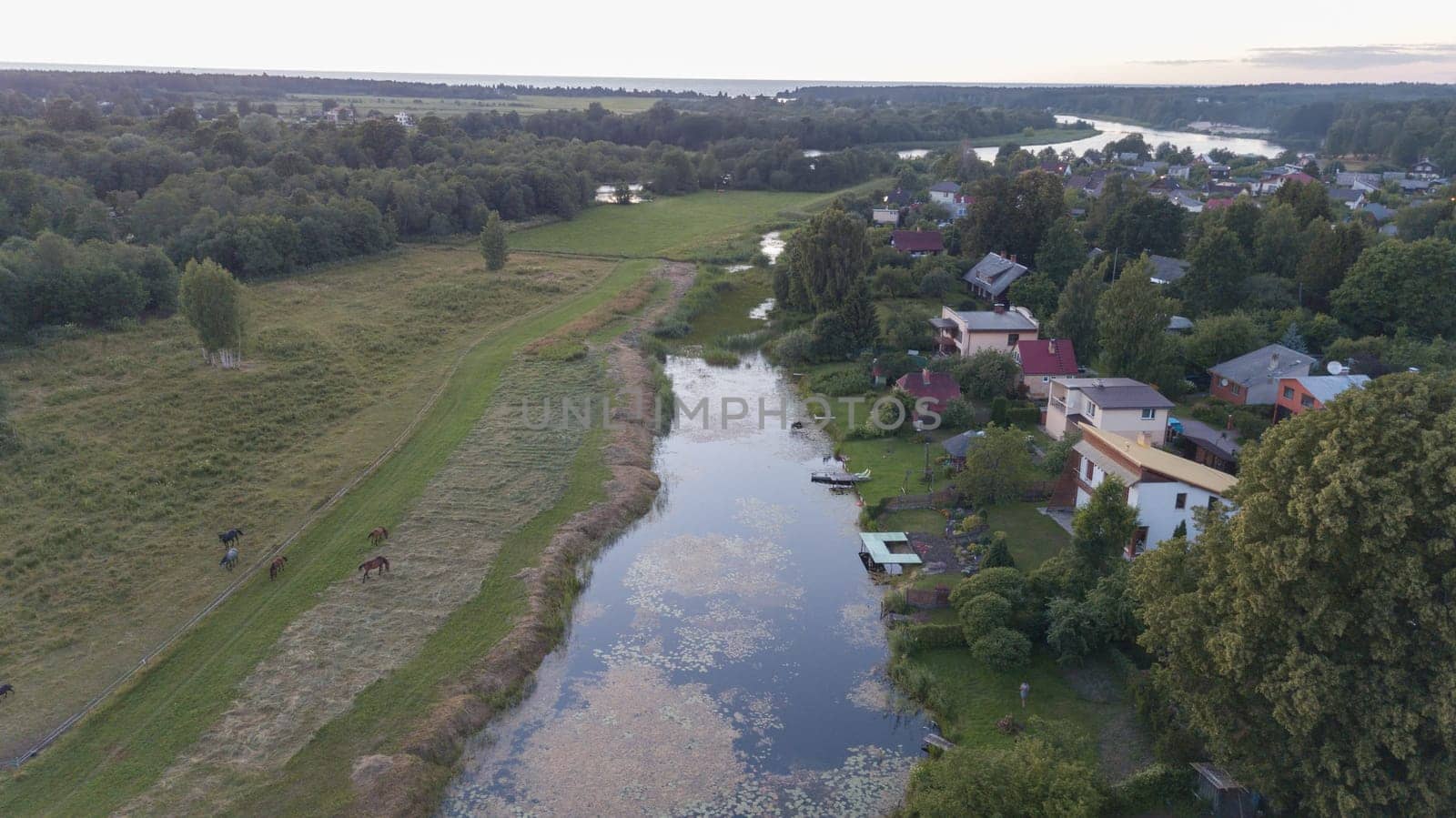 Aerial view of countryside Gauja lake field drone top view