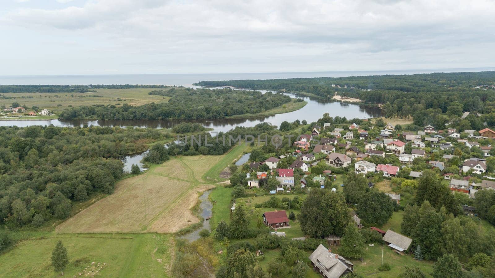 Aerial view of countryside Gauja lake field drone top view