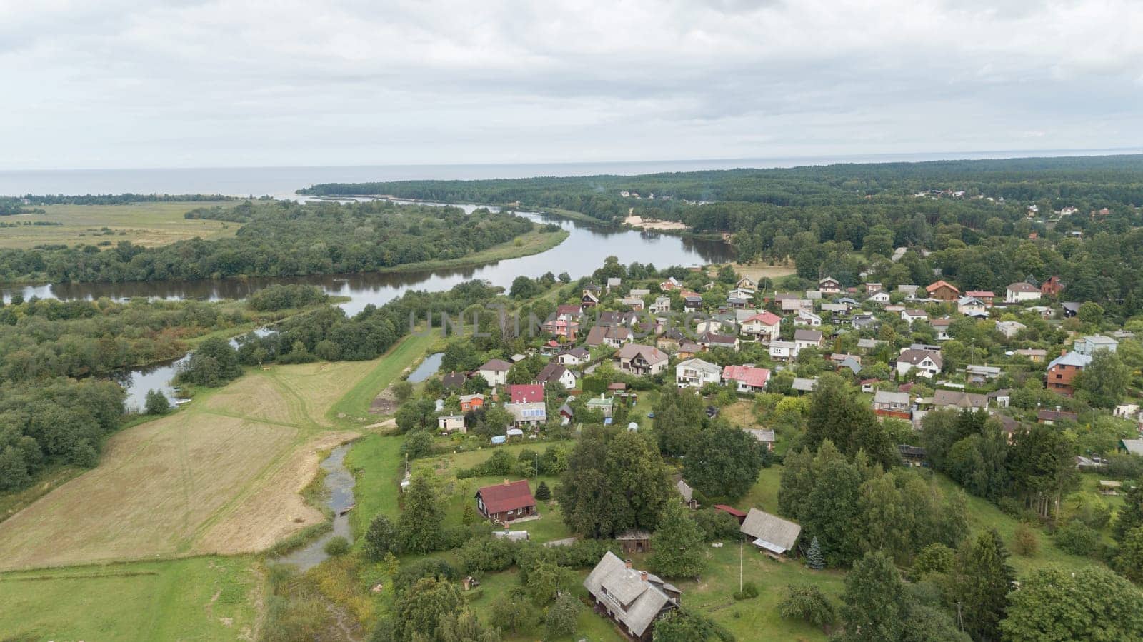 Aerial view of countryside Gauja lake field drone top view