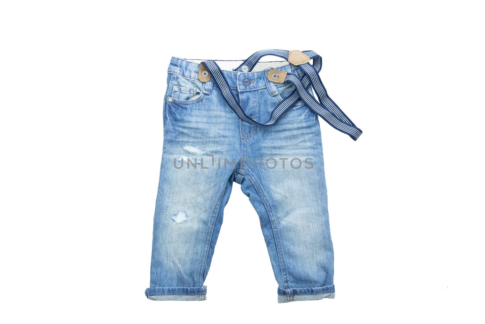 children clothes. Blue jeans with braces, suspenders