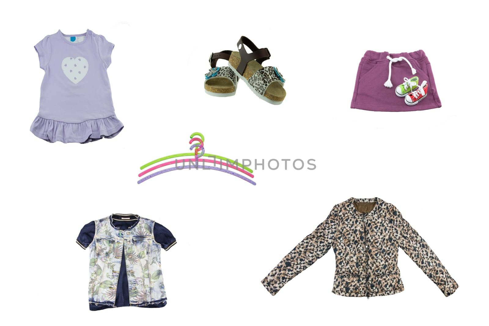 Collage of children clothes. Concept spring and summer clothes. Isolated on white. Close up.
