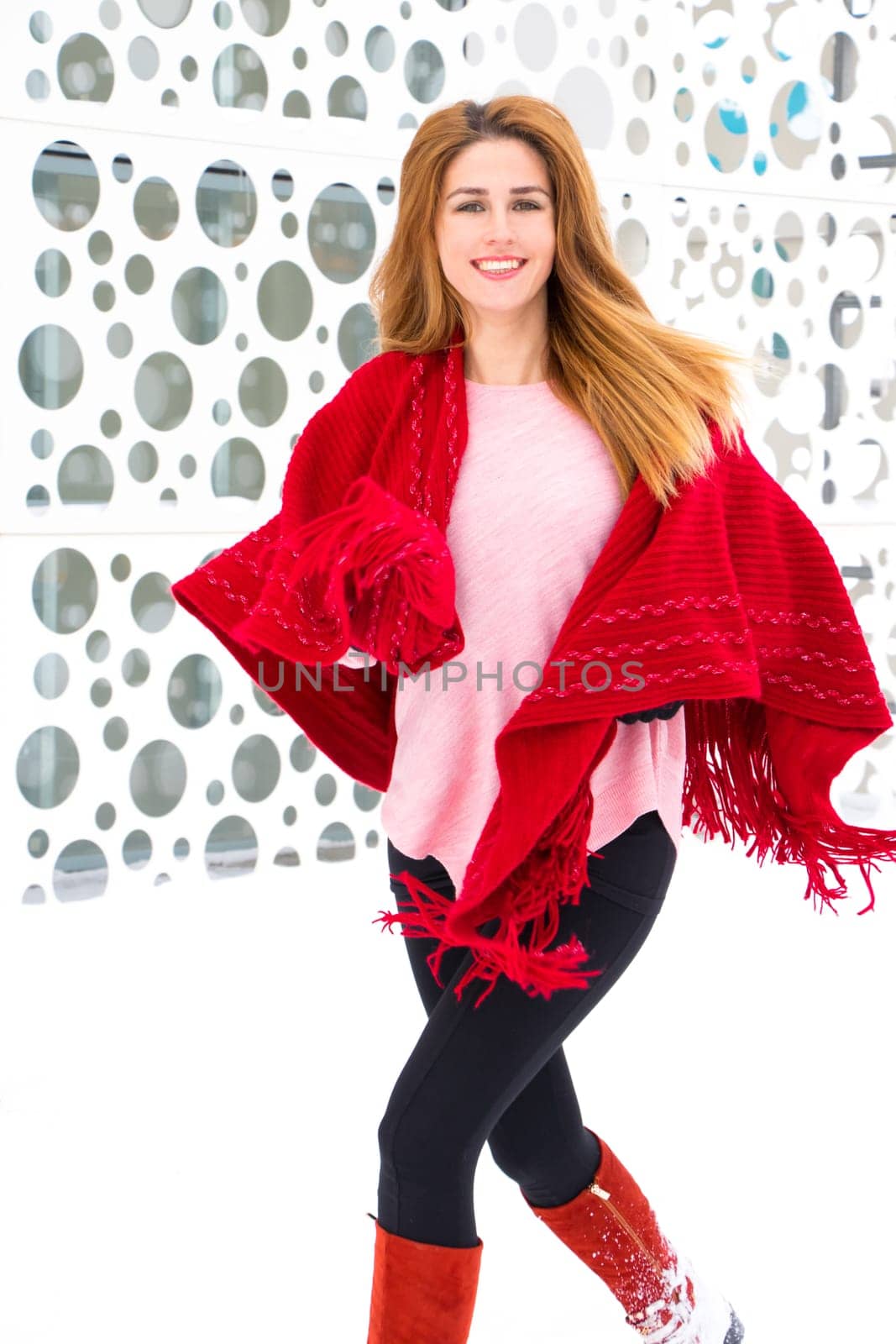 Young girl playing in the snow