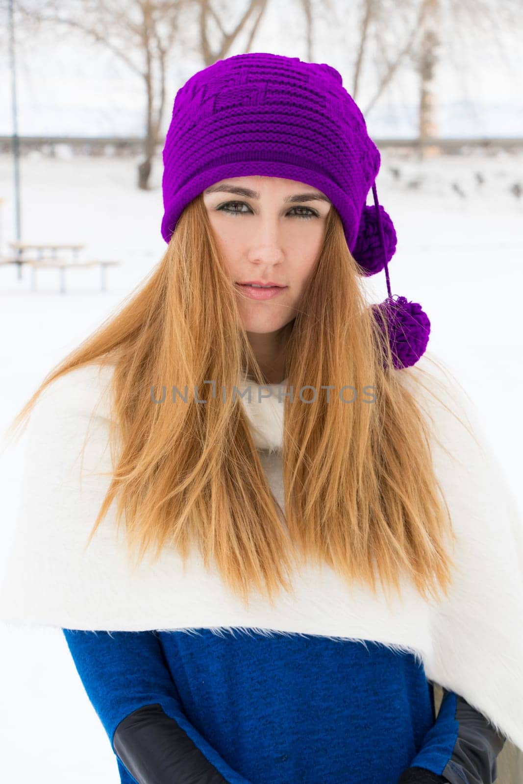 Young girl playing in the snow