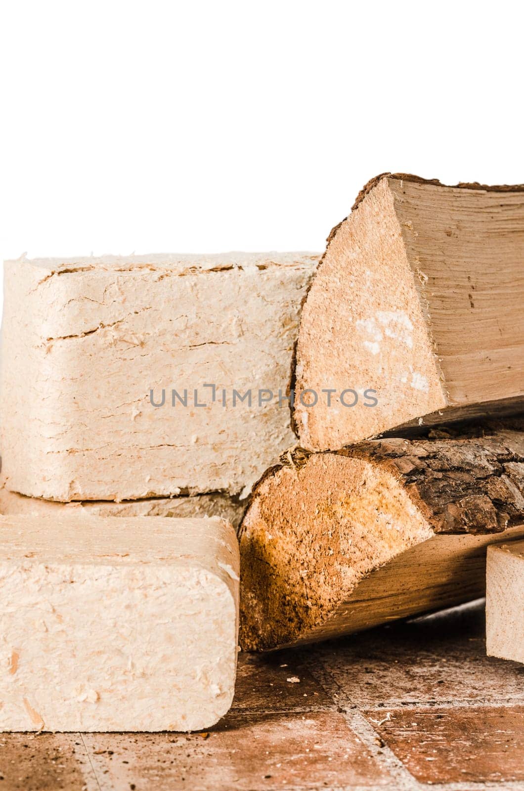 Wood briquette and firewood, close-up