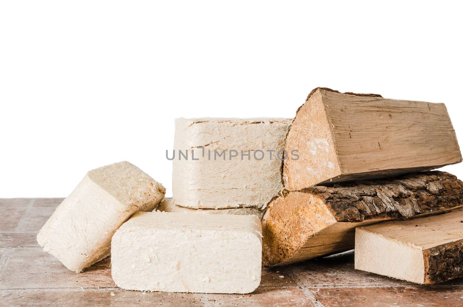Wood briquette and firewood, close-up