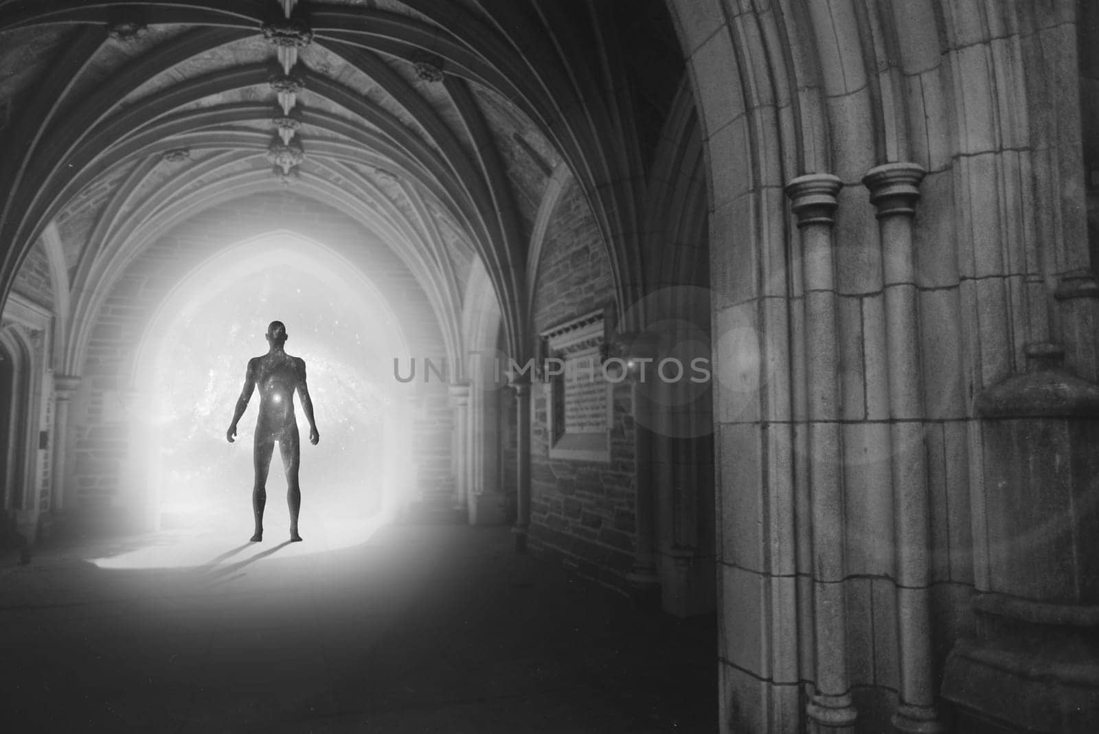 Messenger from other worlds. Human silhouette with universe inside stands in gothic archway with light illuminating the path.