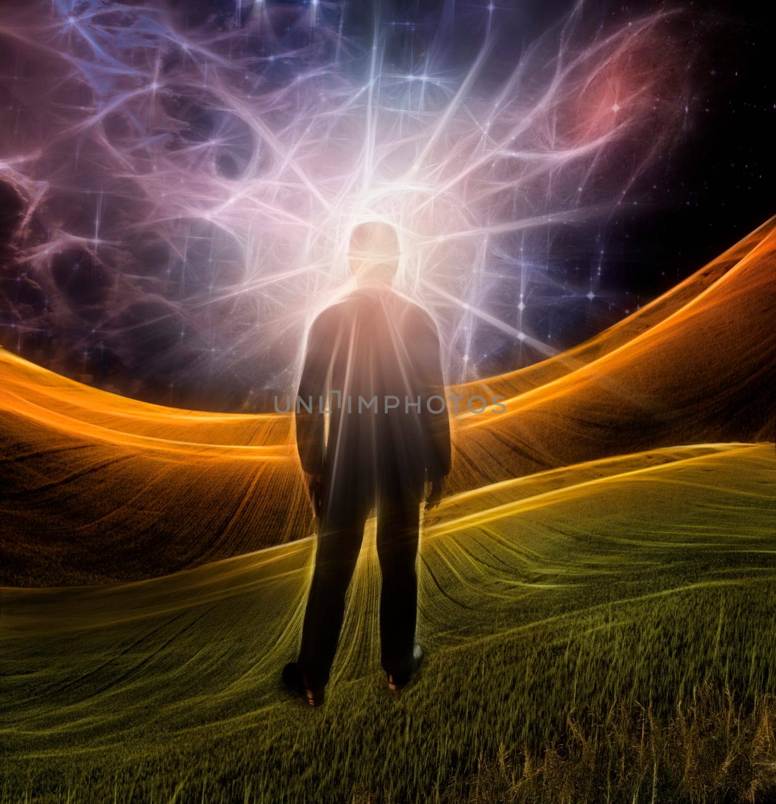 Explosion of imagination. Man stands in green field