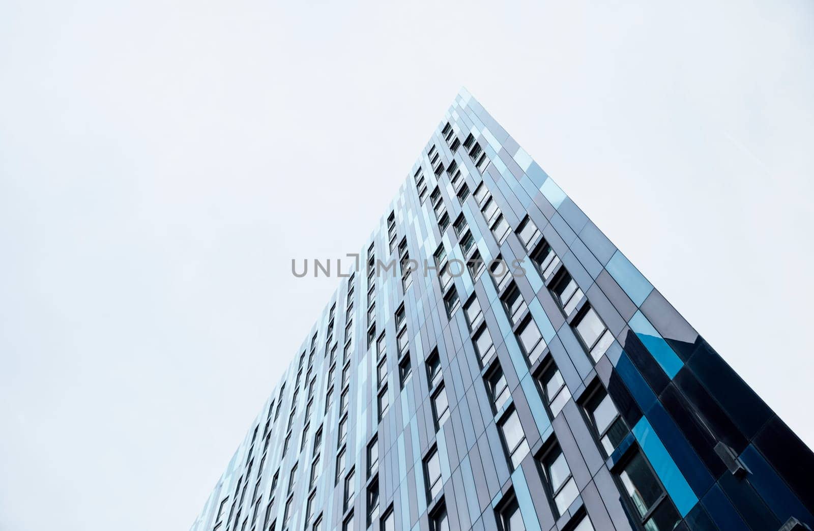 Low angle view of an office building in a city.