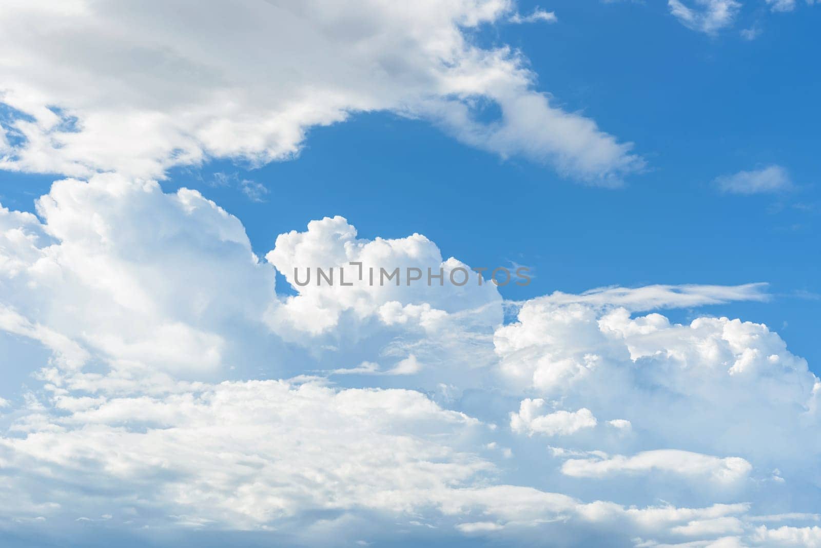 natural blue sky background with white clouds