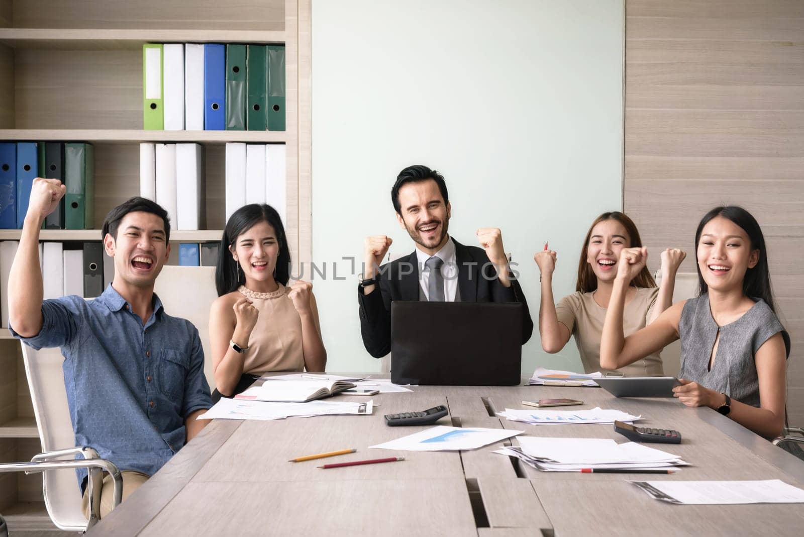 Business people happy after signing agreement in office, successful teamwork concept