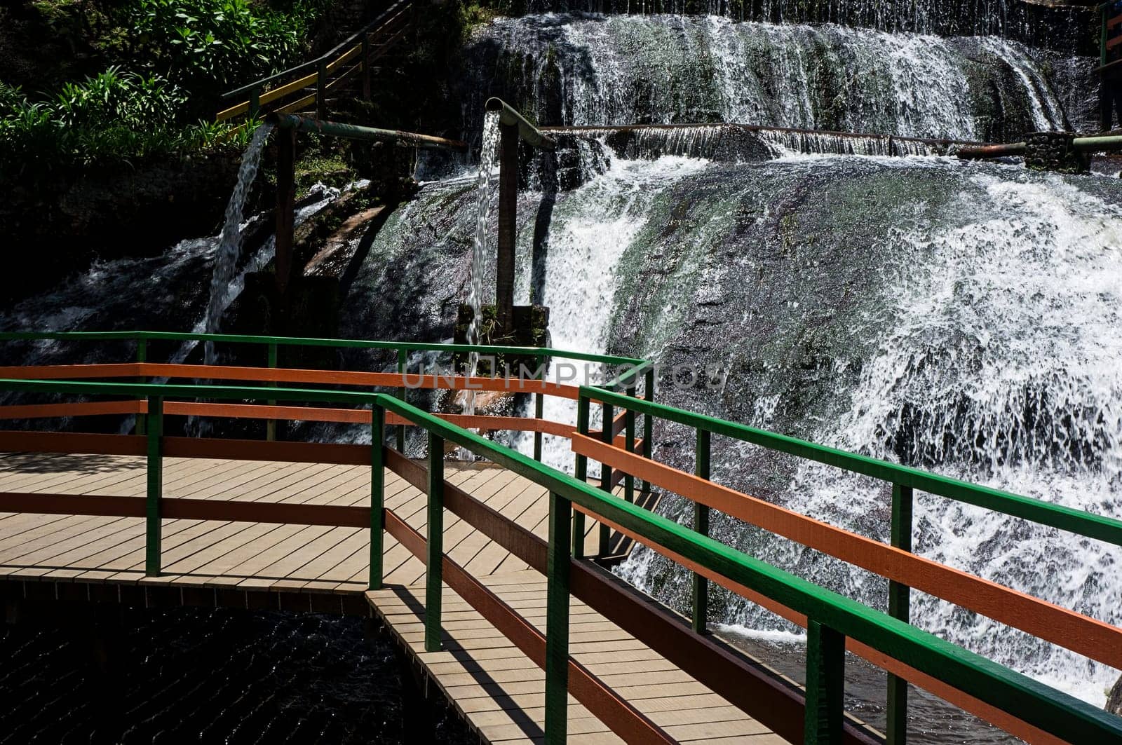 tourism destination Campos do Jordao Brasil water pipe wooden bridge