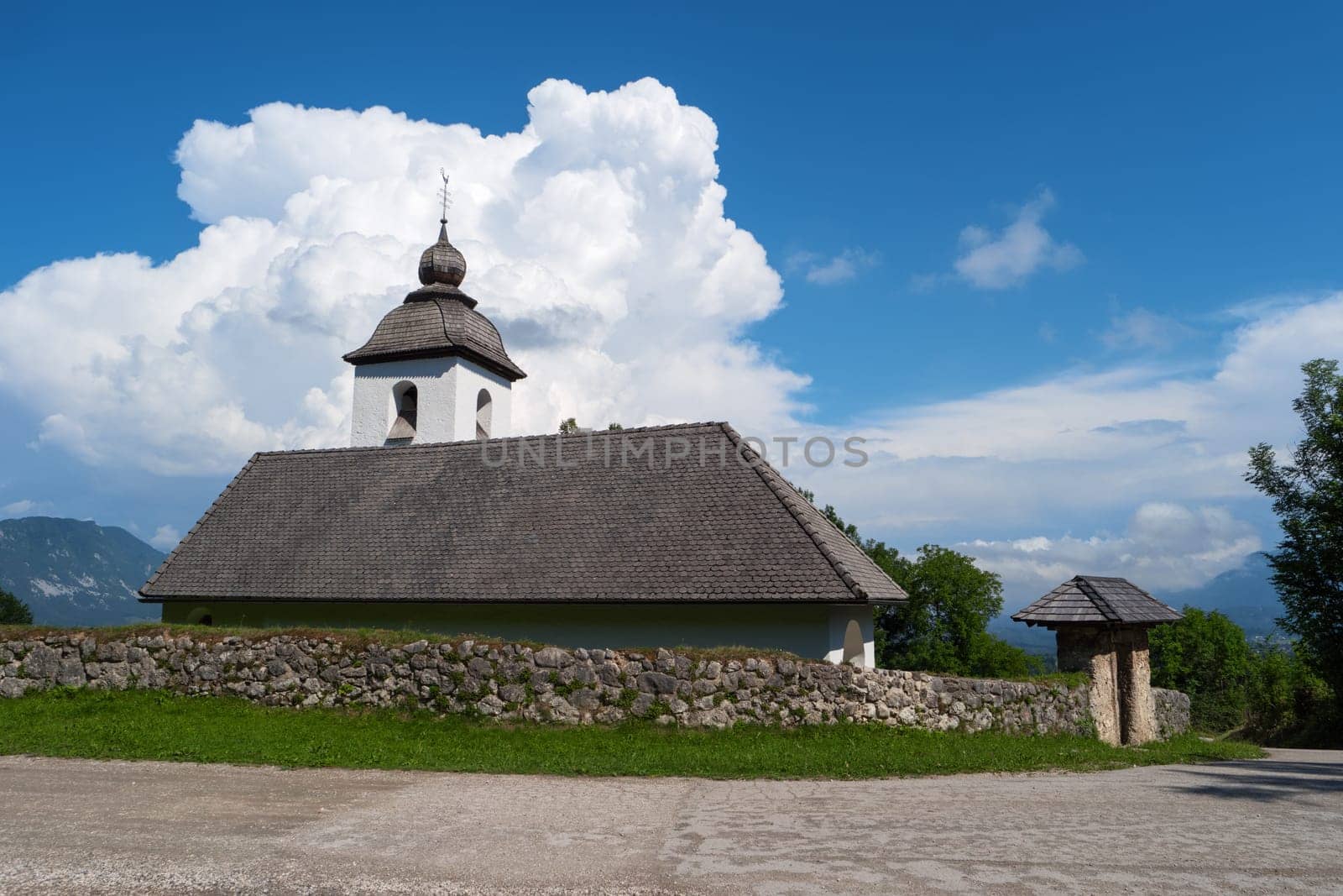 Church of St. Catherine, Zasip, Slovenia, Europe. Typical small historic ancient country mountain Saint Catherine church, slovenian Alps. Mountain slovenian landscape, Julian Alps, near Bled, Slovenia