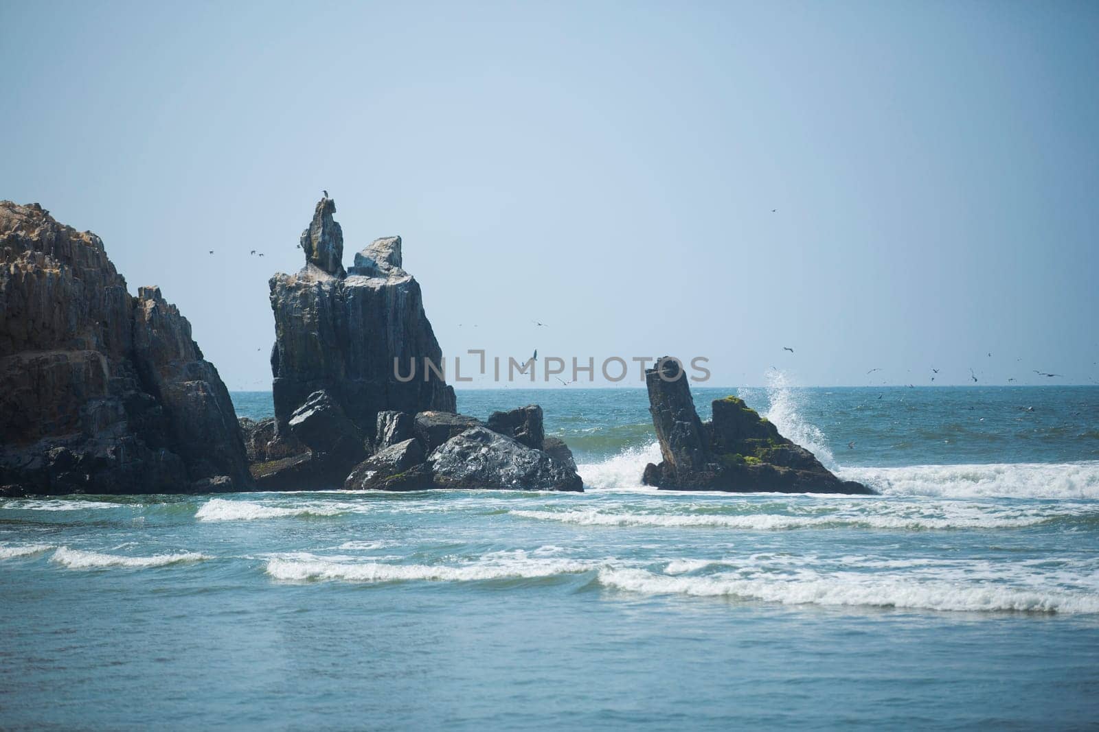 rocky coast along the ocean. Peru