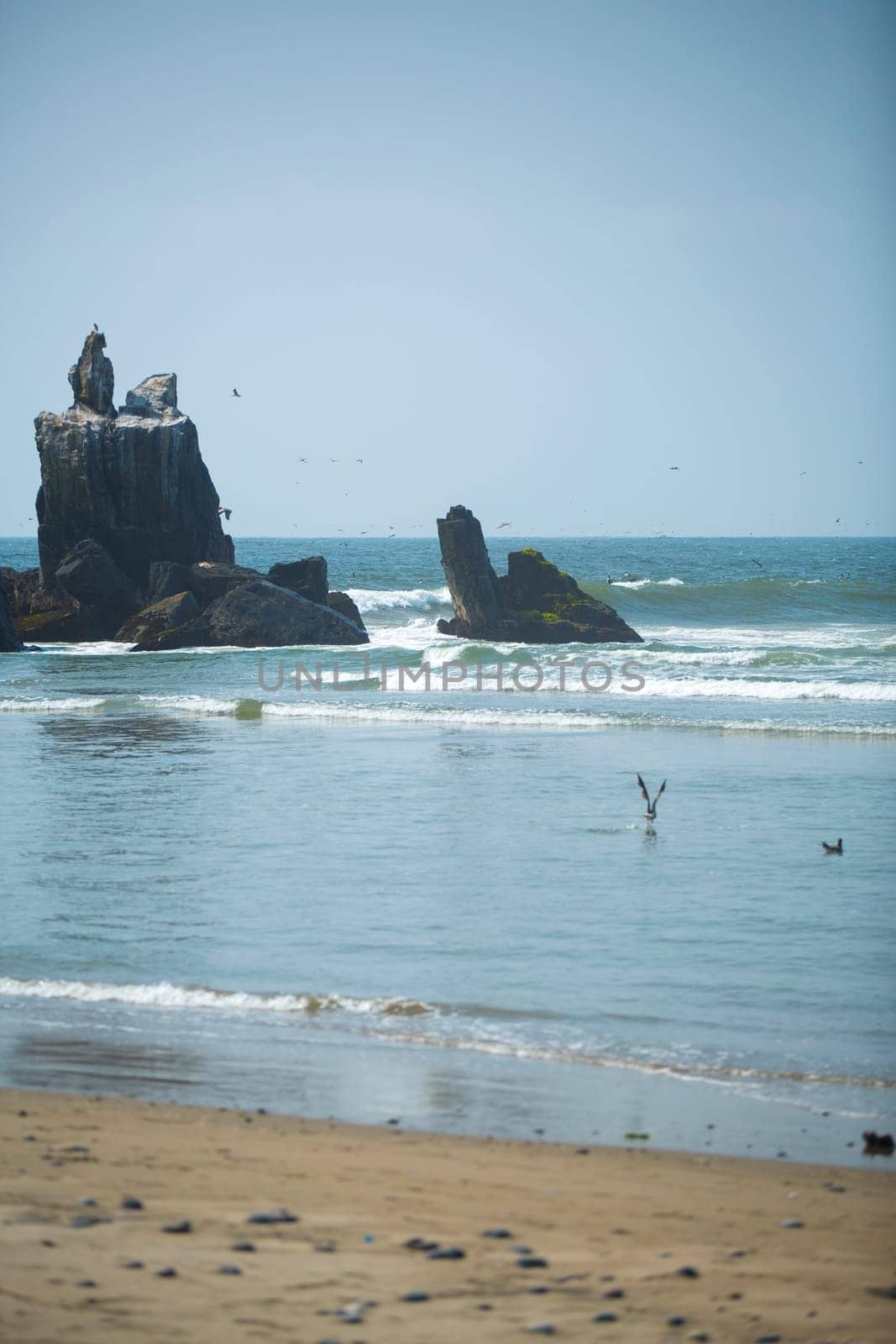 rocky coast along the ocean. Peru